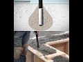 Concrete vibrating machine.