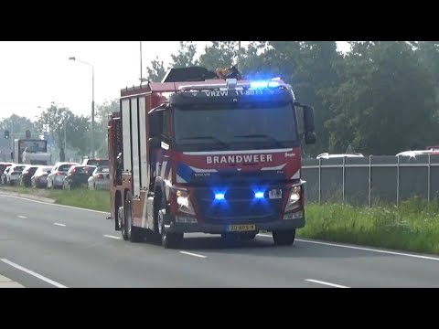 Brandweer zaandijk HV 118071 met spoed naar een voertuig te water in Heemskerk