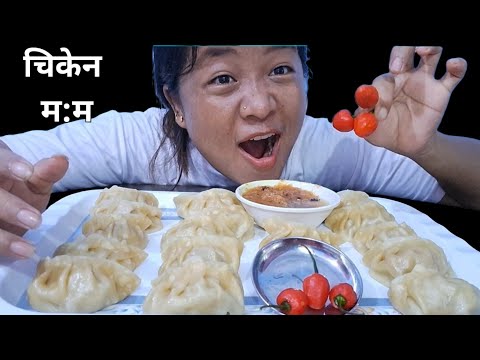 Eating chicken momos with dalle khursaani and tomato`s pickle .#love#share#support.