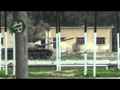 تمركز عناصر كتيبة عبد الله بن سلام خلال اقتحام إدارة المركبات في ريف دمشق