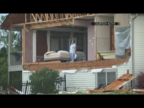 A vicious storm tore through the Kansas City area, spawning tornadoes that downed trees and power lines, damaged homes and injured at least a dozen people in the latest barrage of severe weather. (May 29)
