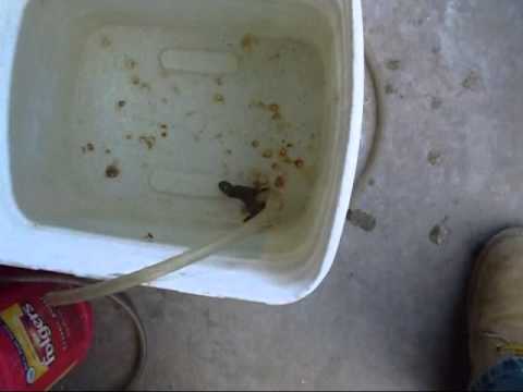 Part of a video titled Checking Carb floats - YouTube