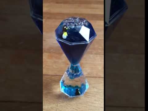 Cartel del vídeo de YouTube para El reloj de arena pingüino