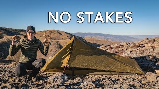 How to Set Up Any Tent Using Only Rocks (Guide)