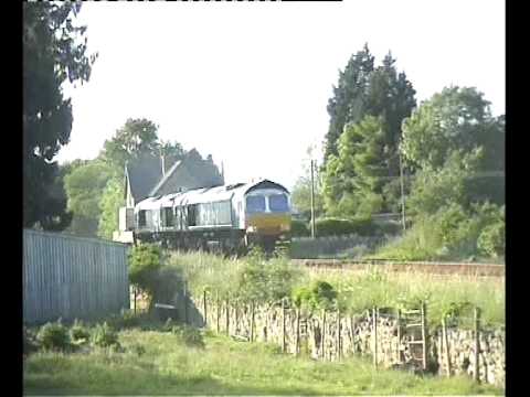 DRS 66414+66411 on 6K73  thru Black Dyke AHB at Arnside on 17th June 2010.avi