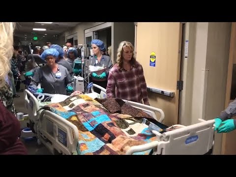 Hospital Staff Line ICU Hallway To Honor Dying Patient Donating Organs