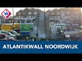 Twee zware stukken van de Atlantikwall uit de grond gehaald - OMROEP WEST