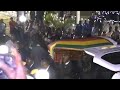Coffin of ex-president Mugabe arrives at his former residence "Blue Roof" in Harare | AFP Coffin of ex-president Mugabe arrives at his former residence "Blue Roof" in Harare | AFP