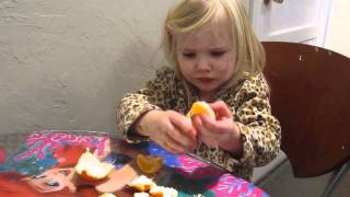 Lucy Peeling Oranges