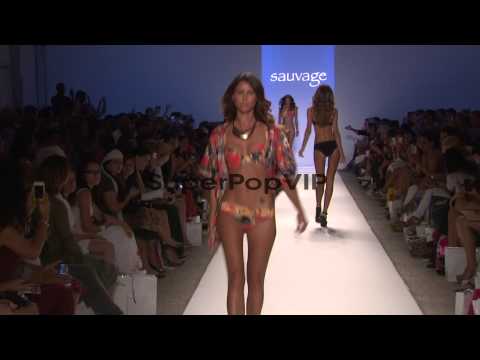 Models walk the runway during the Sauvage swimwear 2013 s...