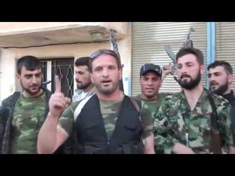 بيان يلقيه النقيب إياد الديك يتحدث عن العمليات العسكرية التي خاضها لواء خالد بن الوليد في مدينة الرستن