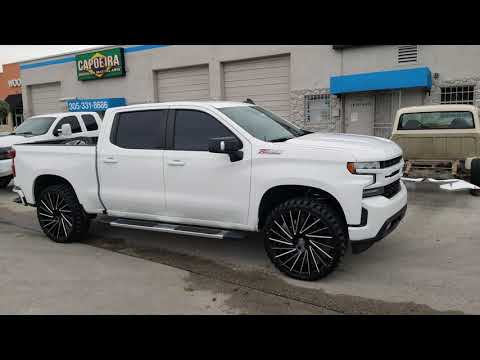 877-544-8473 26" Lexani Wraith Black Wheels 35" Mud Tires 3" Lift Chevy Silverado DUBSandTIRES.com