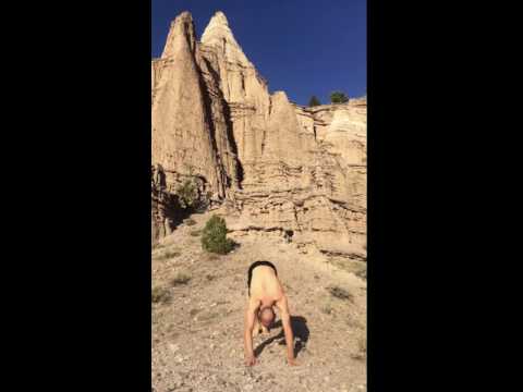 My hubby doing yoga at the top of the castle rock 