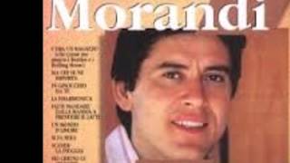 Kadr z teledysku Leonor (Scende la pioggia) tekst piosenki Gianni Morandi