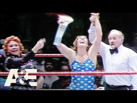 Cyndi Lauper & Wendi Richter Make WWE History at WrestleMania 1984 | WWE's Greatest Moments | A&E