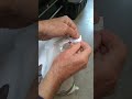 Unzipping a Kitty Litter Bag