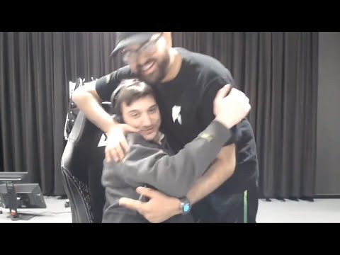 Arteezy gets a hug from Bulba after taking down their previous org in game 1