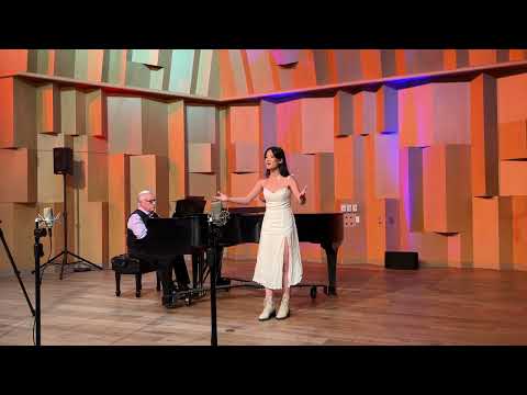 Vivian Sun performing musical theater on stage
