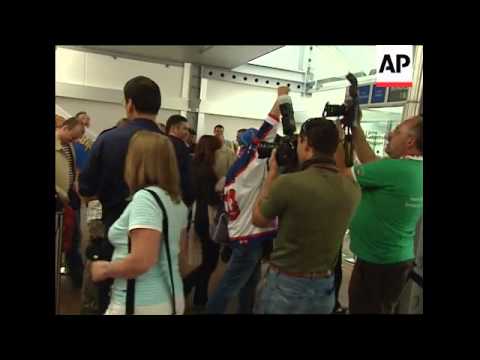 Russia and Spanish fans arrive to cheer on their teams