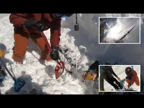 Skier is buried under an avalanche, as his brother digs him out