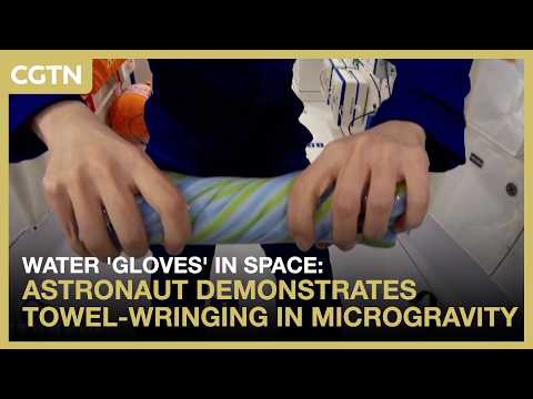 Water 'gloves' in space: Astronaut demonstrates towel-wringing in microgravity