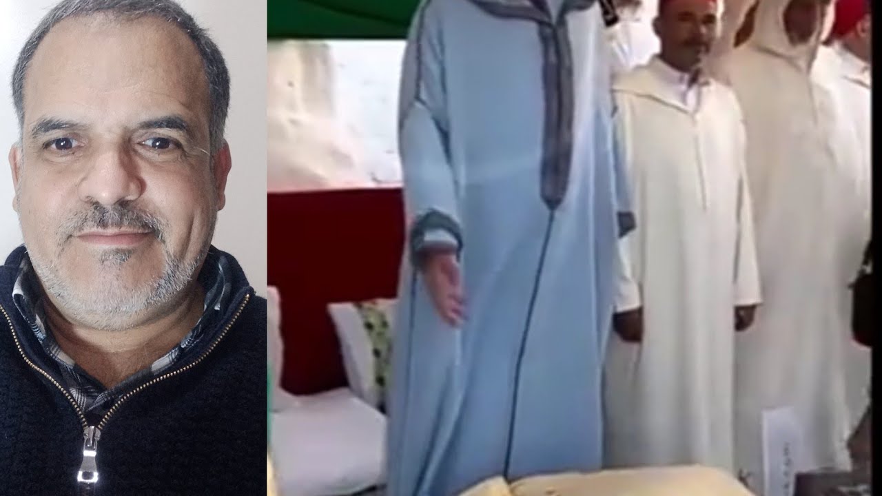 تقبيل أرجل ولي في ضريح منطقة بطنجة.البركة من شيخ من خلال قارورة ماء