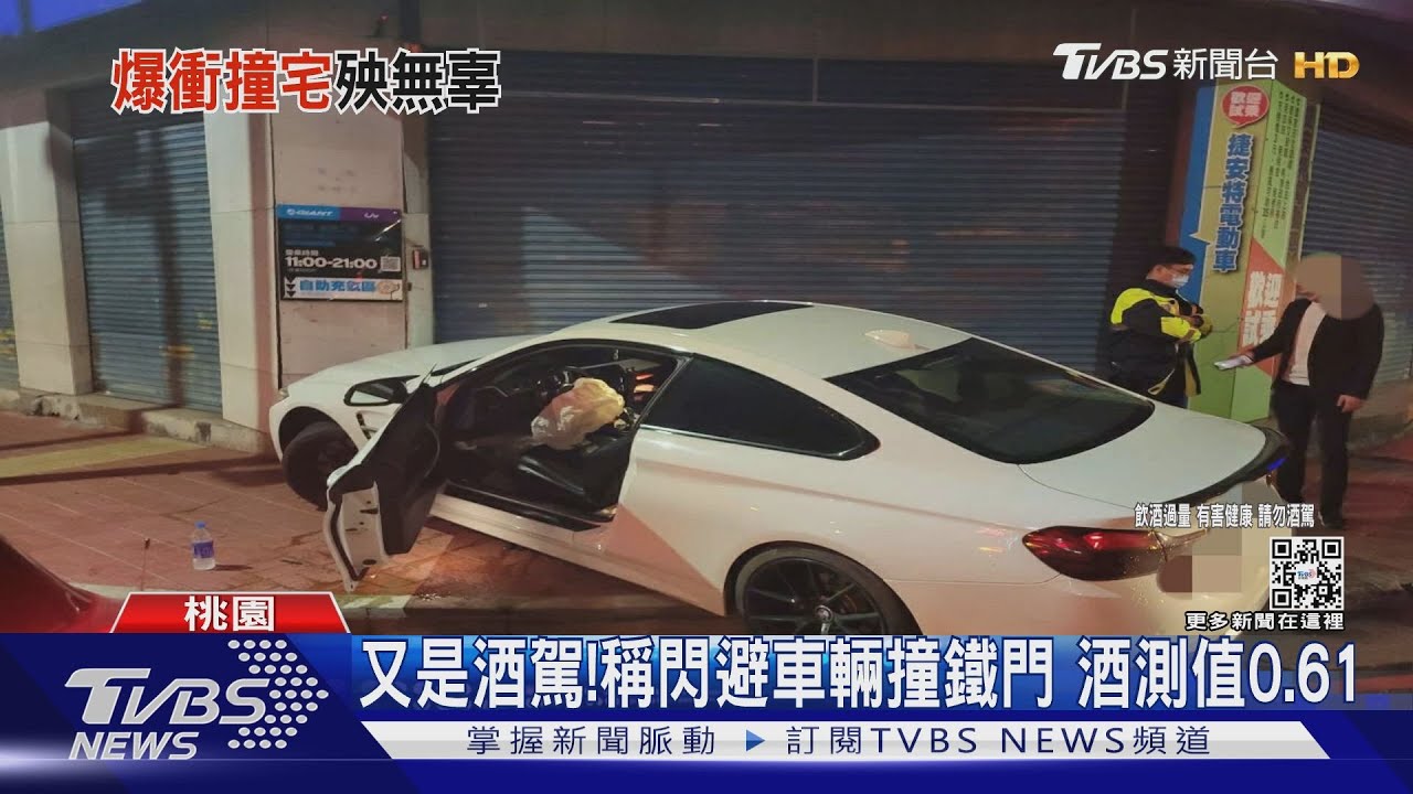 碰!男酒駕轉彎失控 直撞店家鐵捲門