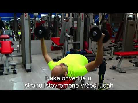 vežba razvlačenje bučica na ravnoj klupi