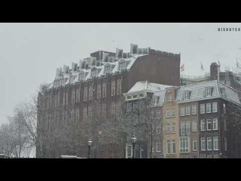 2026 Amsterdam city centre covered in snow.