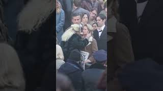 Lady Gaga kisses female bystander as she shoots a scene for Joker