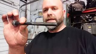 Super important step - cleaning the engine head bolt holes using a old bolt
