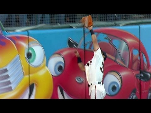 Tanaka makes leaping grab against the wall