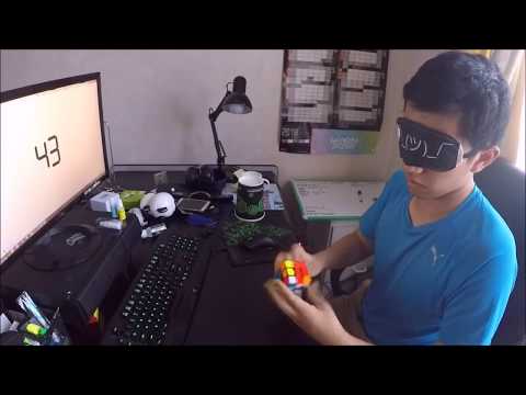 164 Digits of Pi recited while solving a Rubik's Cube blindfolded