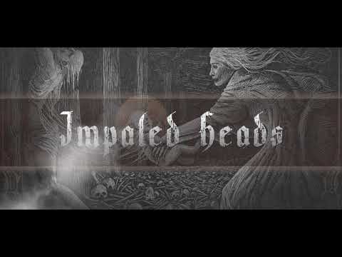 Smouldering In Forgotten - Impaled Heads