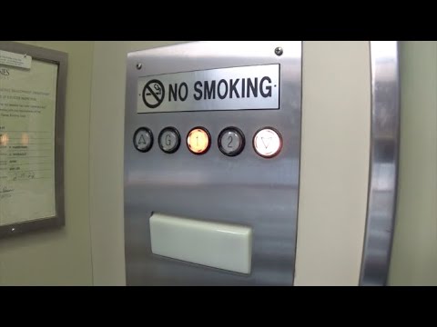 White Evans Hydraulic Glass Elevator @ 950 Lee Street in Des Plaines, IL