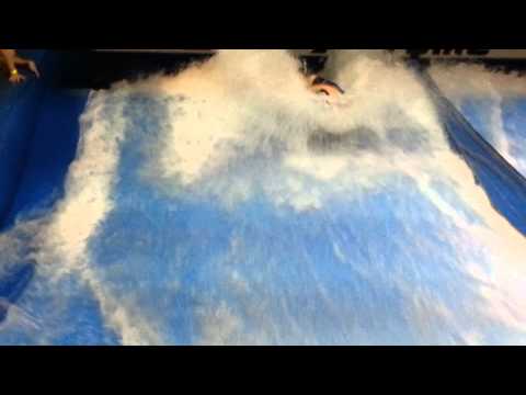 Surf extreme head spin belly slide