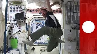 From outer space:  Astronauts in football fever