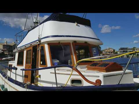 Cabin outside walkaround CHB-34 Trawler. Beautiful wood and overall condition.
