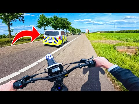 brother drives on the highway with the surron without license plates...