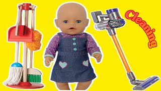 Baby Born Doll Cleans house with toy vacuum cleaner and Melissa and Doug cleaning toys