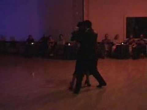  Angelica Grisoni  and  Alejandro Aquino  are  dancing  to  the  milonga  "  La Luciernaga  "