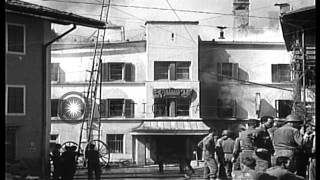United States soldiers and Italian civilians fight fire at headquarters of 1st Ba...HD Stock Footage