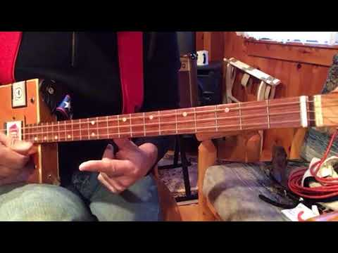 Money for Nothing Dire Straits easy beginner 1 finger lesson  on your 3 string cigar box guitar