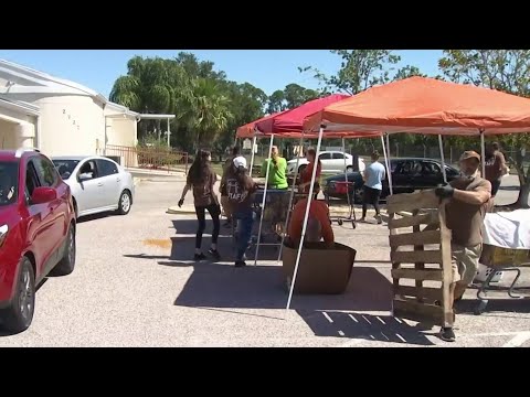 Pet Alliance of Greater Orlando provides pet food donations to those in need