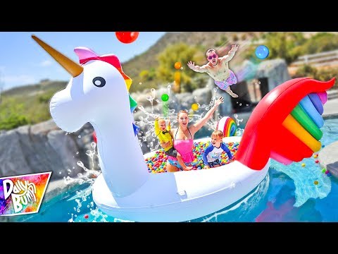 Giant Rainbow Unicorn FLOATING BALL PIT Swimming Pool Party! 🦄 💦 Video