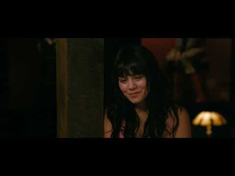 Official Beastly (2011) trailer still: Kyle and Lindy framed against nighttime Manhattan lights