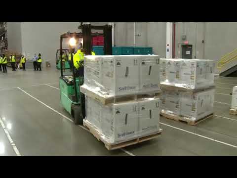 COVID Vaccine Wheeled Into Hospital As Different Classic Sports Themes Play Is Fantastic