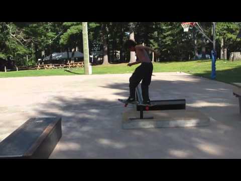 Felipe Gustavo (age 12)-kickflip front board kickflip out down rail