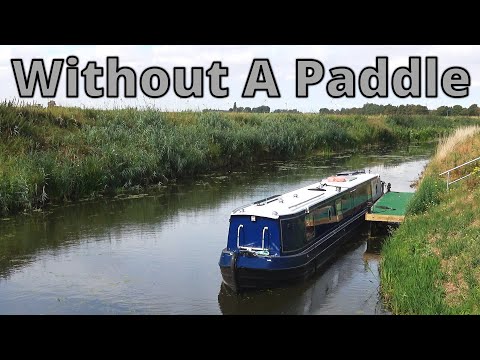 277. Narrowboat cruising up a creek in Cambridgeshire