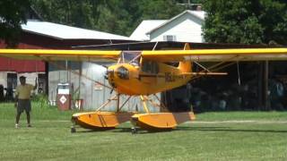 preview picture of video 'Angelica14709  American Legend  J-3 Float Plane Take off Grass'